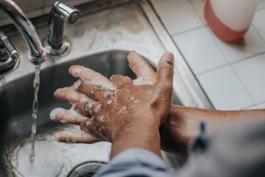 person washing hands